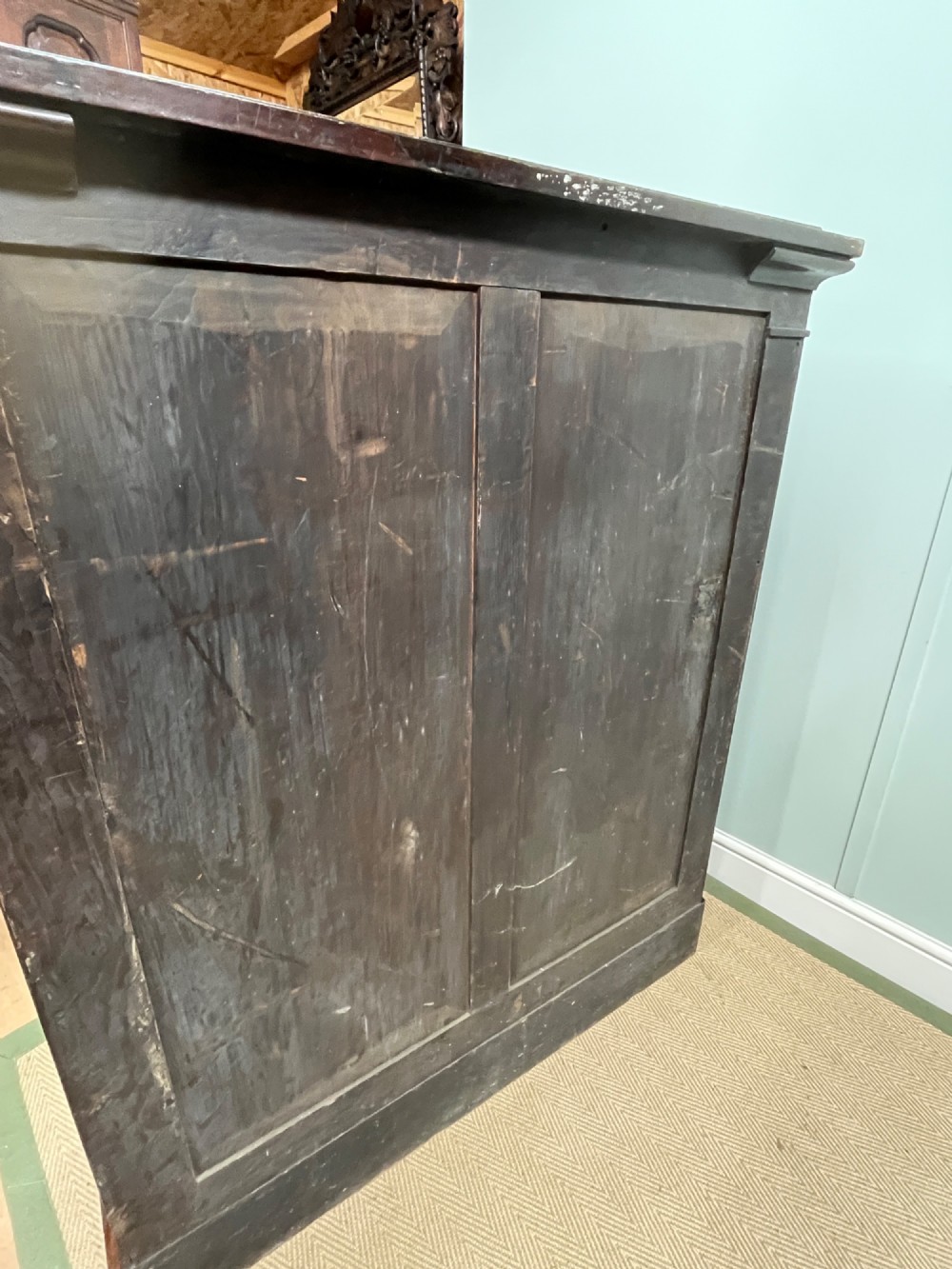 A George IV open rosewood dwarf bookcase featuring carved acanthus pilasters, four open shelves, and a grey marble top. View XI