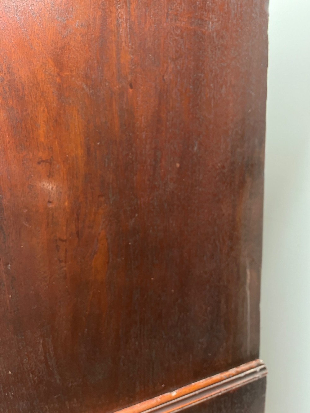An 18th-century Georgian mahogany chest on chest featuring two short over six long graduated drawers with brass swan-neck handles and ogee bracket feet. View XIII