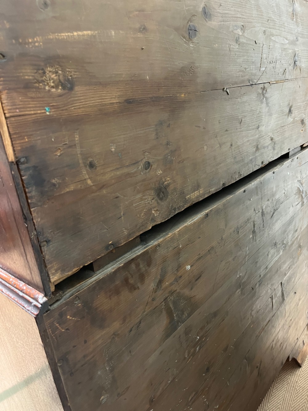 An 18th-century Georgian mahogany chest on chest featuring two short over six long graduated drawers with brass swan-neck handles and ogee bracket feet. View XV