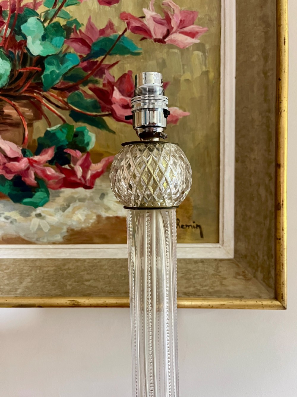 A clear cut crystal table lamp base featuring a fluted central column and a diamond-cut domed foot. View III