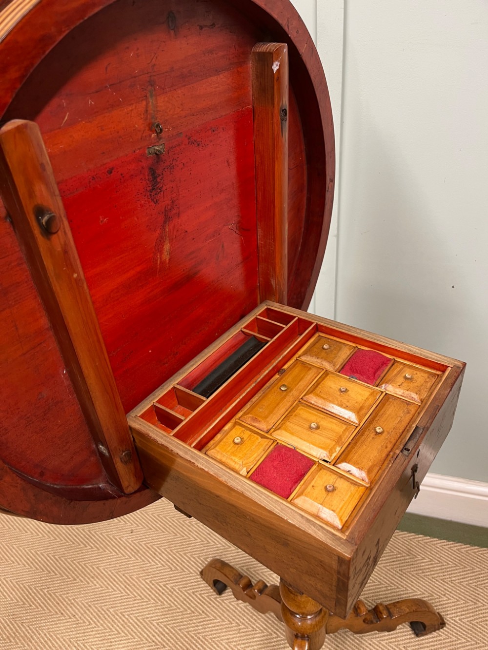 A nineteenth-century Italian circular tilt-top table featuring intricate geometric inlaid wood, a central chessboard design, and a turned pedestal on a tripod base. View IV
