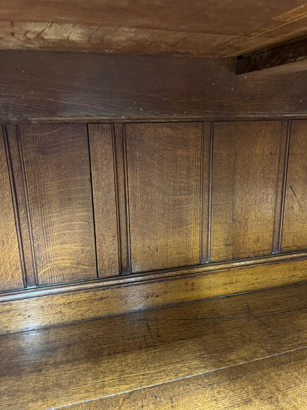 A 19th-century oak dresser featuring a three-tiered open shelf rack above two drawers with brass swan-neck handles and an open pot board base on turned legs. View XI