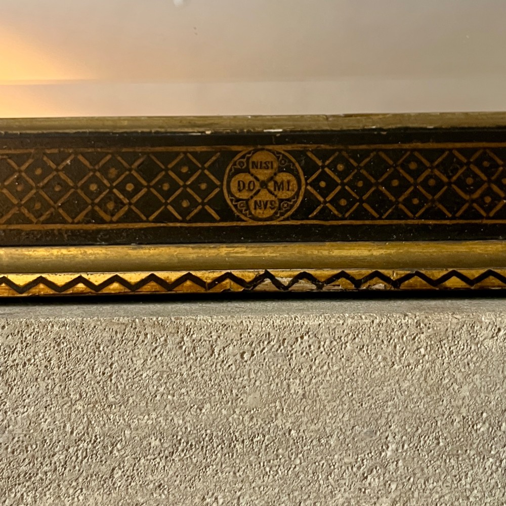 A large nineteenth-century rectangular wall mirror featuring a dark painted frame embellished with geometric motifs and a gilded outer border. View IV