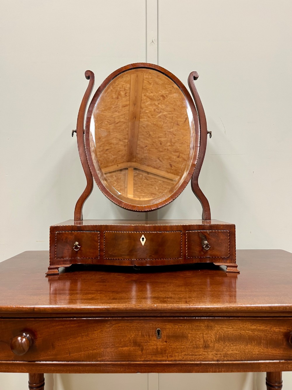 Georgian oval mahogany dressing table mirror