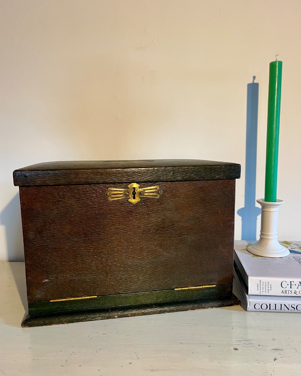 An open nineteenth-century dark green leather stationery box featuring brass fittings, interior memo panels, and compartmentalised sections. View VI
