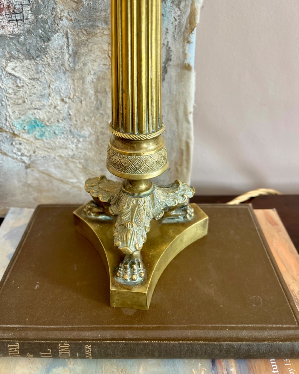 A pair of 19th-century fluted brass table lamps featuring claw feet bases and colourful pleated ikat fabric shades. View III