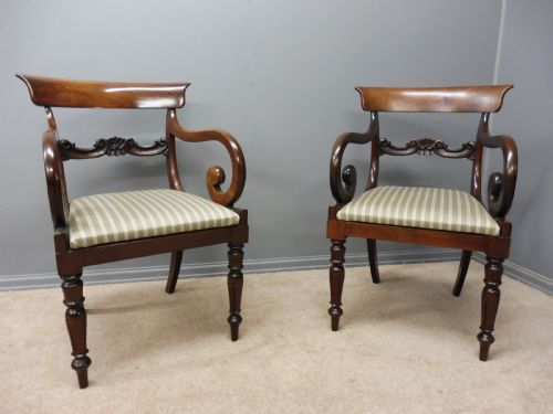 A Very Good Pair of Regency Mahogany Elbow Chairs