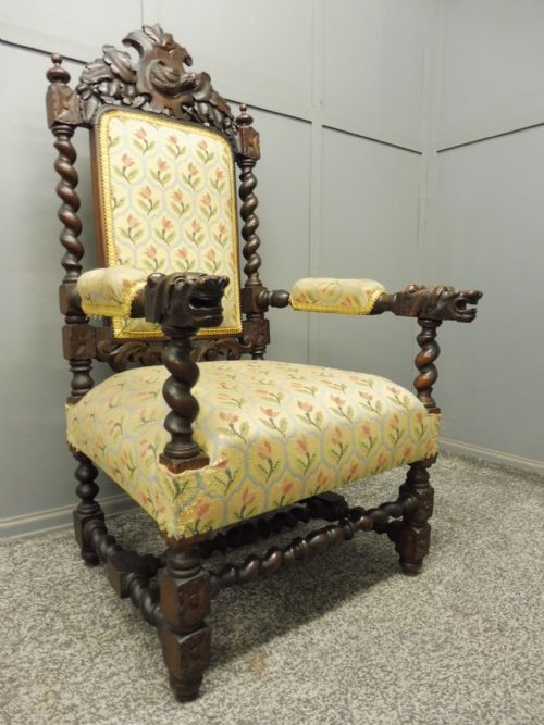 Carved Oak 19th Century Armchair with Dogs Head Arms