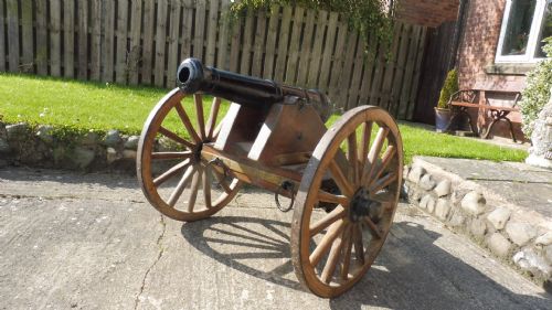 ANTIQUE CAST IRON CANNON AND CARRIAGE - ADDITIONAL PHOTO 1
