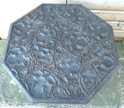 PROFUSELY CARVED INDIAN OCCASIONAL TABLE - ADDITIONAL PHOTO 1