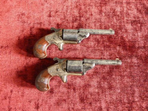 A GOOD PAIR OF AMERICAN RIMFIRE REVOLVERS