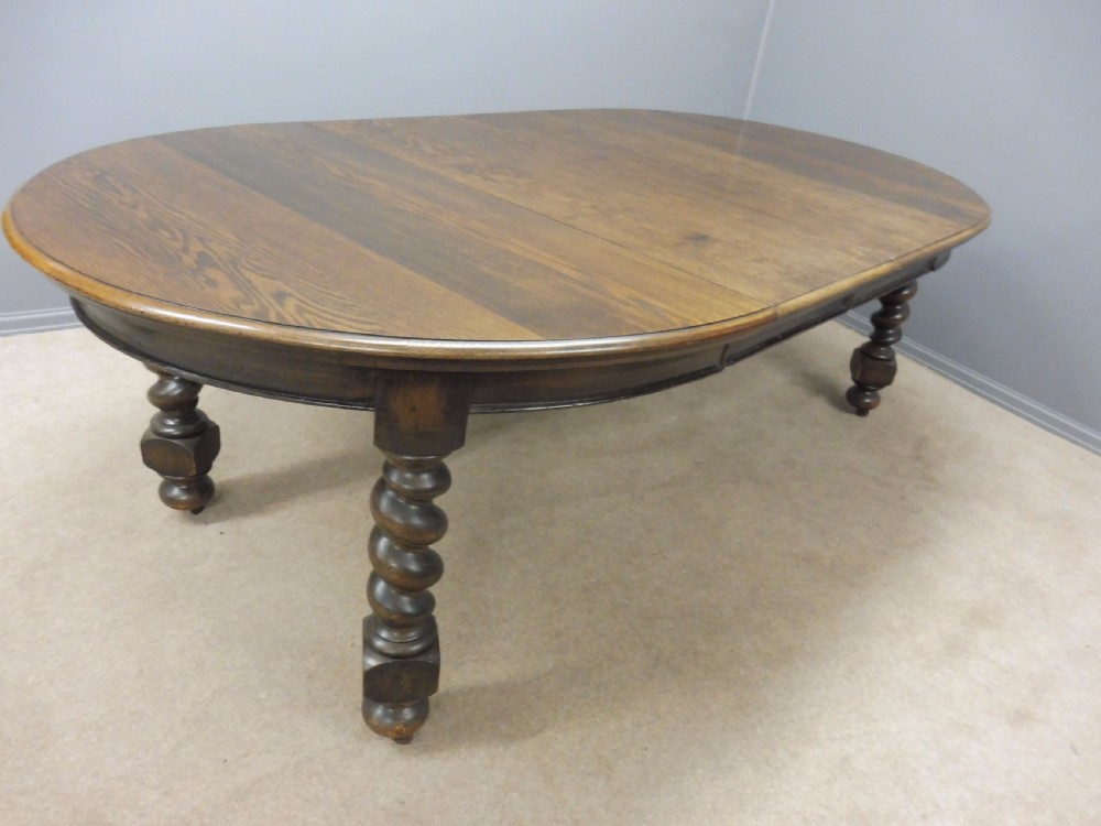 VICTORIAN OAK BARLEY TWIST LEG EXTENDING WIND OUT DINING TABLE SEATS UP TO 8 CIRCA 1890 View II