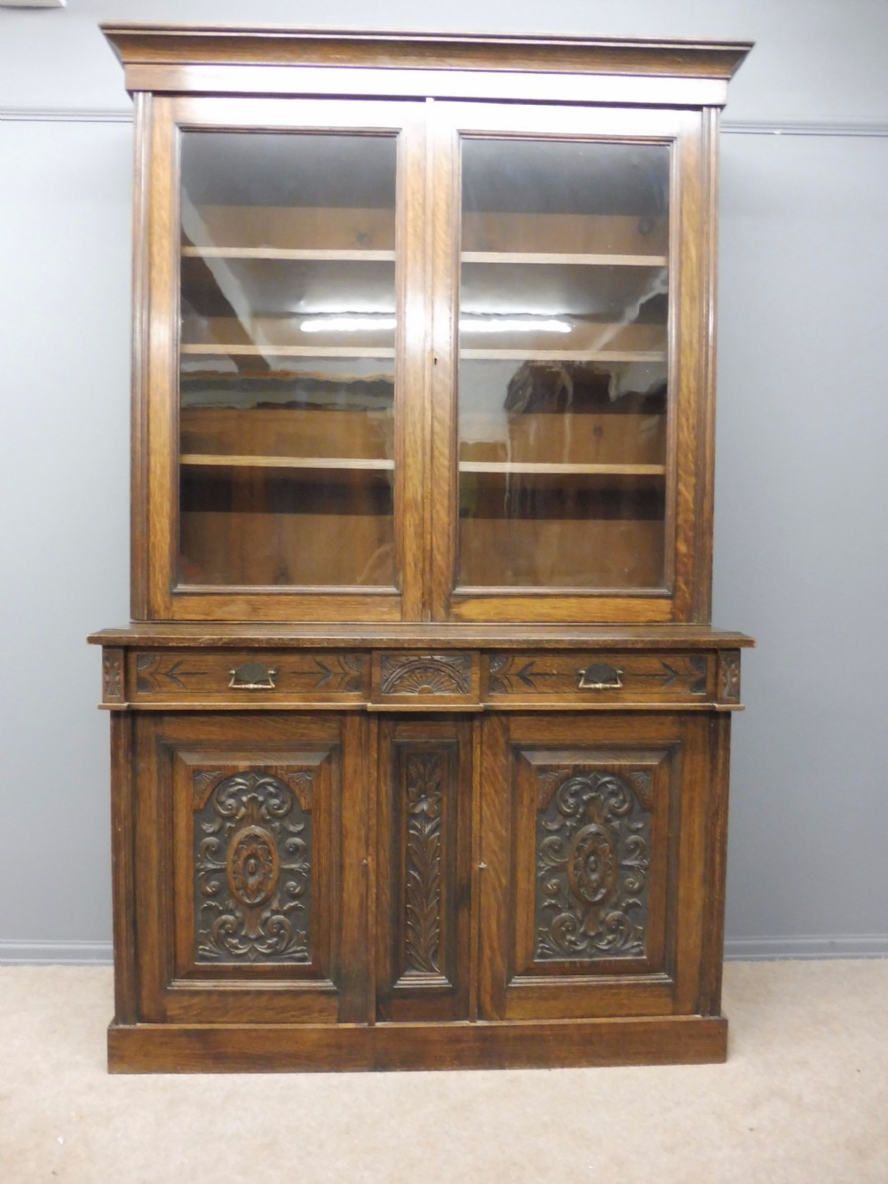 LARGE VICTORIAN CARVED OAK GLAZED BOOKCASE CIRCA 1890 View II