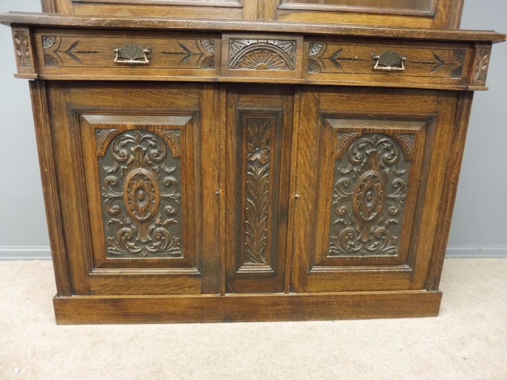 LARGE VICTORIAN CARVED OAK GLAZED BOOKCASE CIRCA 1890 View V