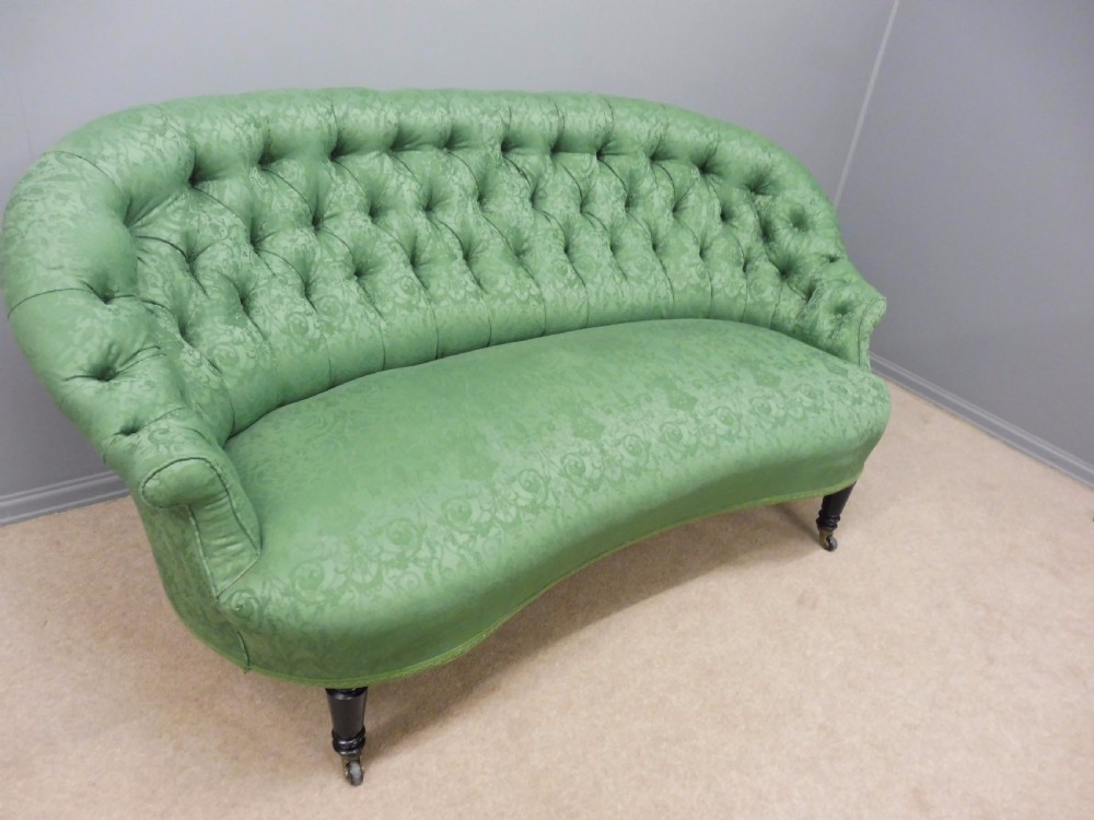 CHARMING CURVED VICTORIAN SOFA ON EBONISED LEGS CIRCA 1890  View II