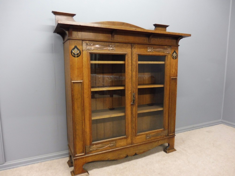 STUNNING ARTS AND CRAFTS OAK INLAID GLAZED BOOKCASE CIRCA 1900 View II