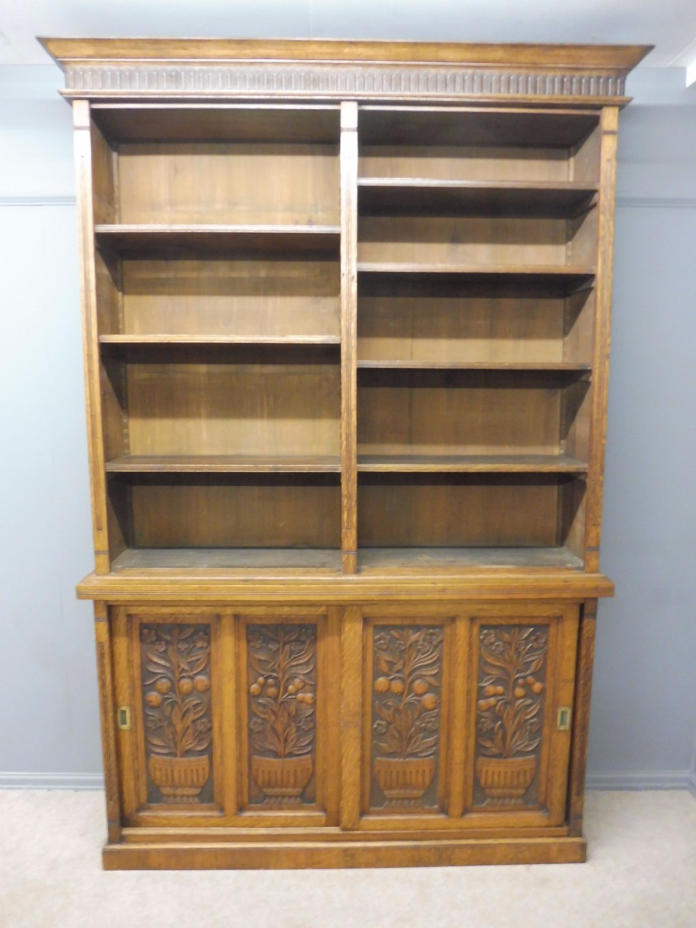 LARGE OAK OPEN TOP BOOKCASE WITH CARVED FRUIT TREE DOORS CIRCA 1900