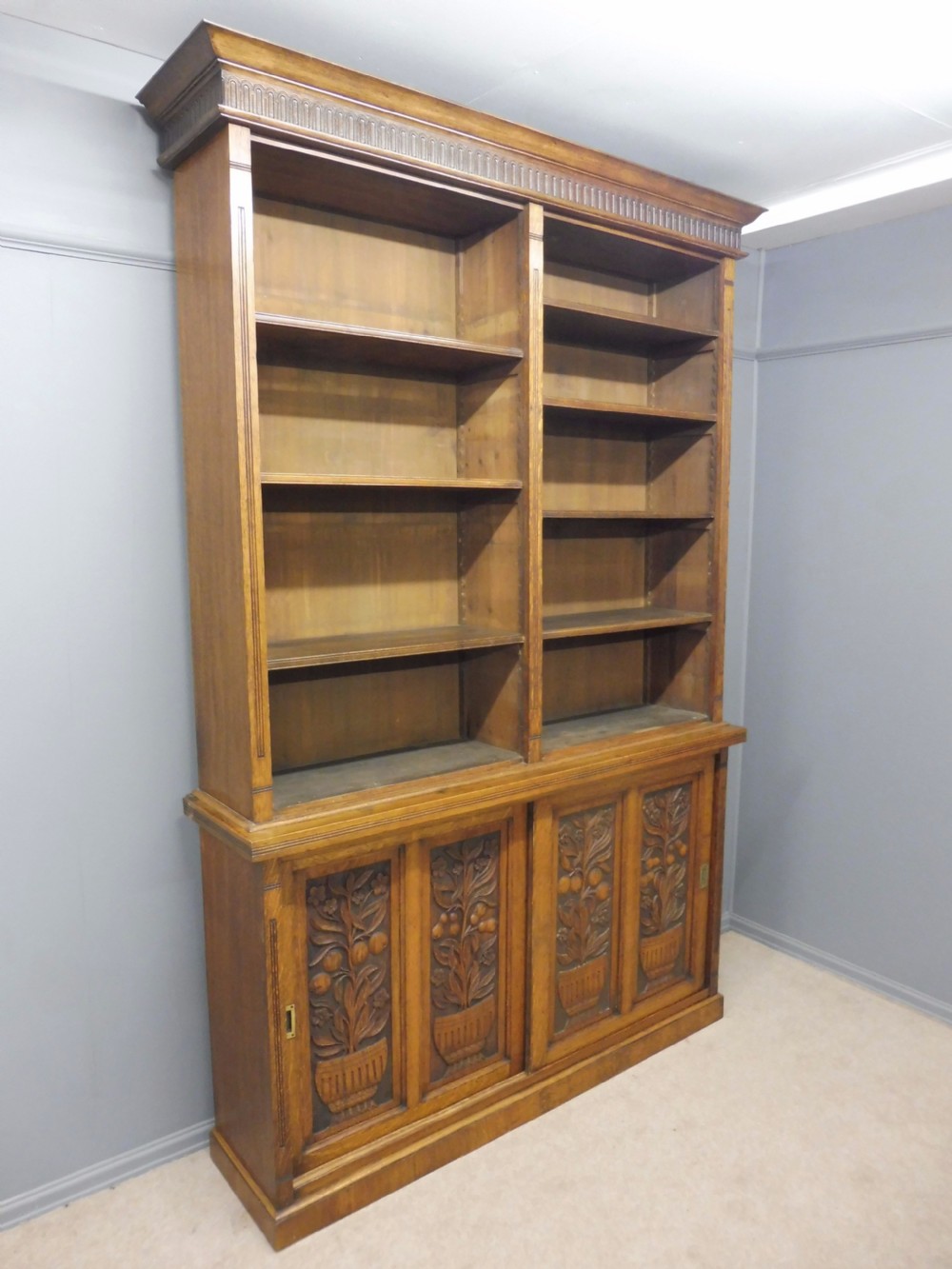LARGE OAK OPEN TOP BOOKCASE WITH CARVED FRUIT TREE DOORS CIRCA 1900 View II