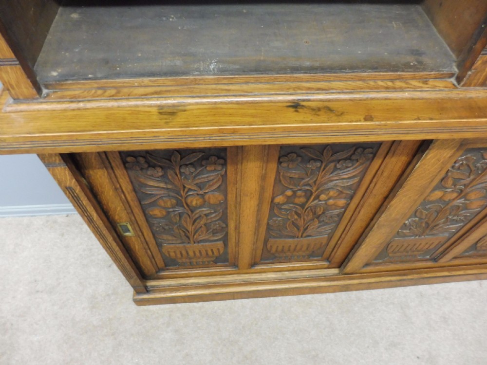 LARGE OAK OPEN TOP BOOKCASE WITH CARVED FRUIT TREE DOORS CIRCA 1900 View VII