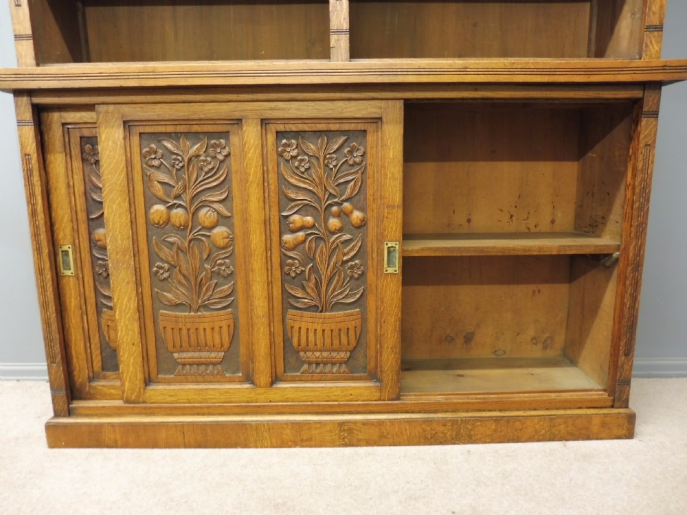 LARGE OAK OPEN TOP BOOKCASE WITH CARVED FRUIT TREE DOORS CIRCA 1900 View X