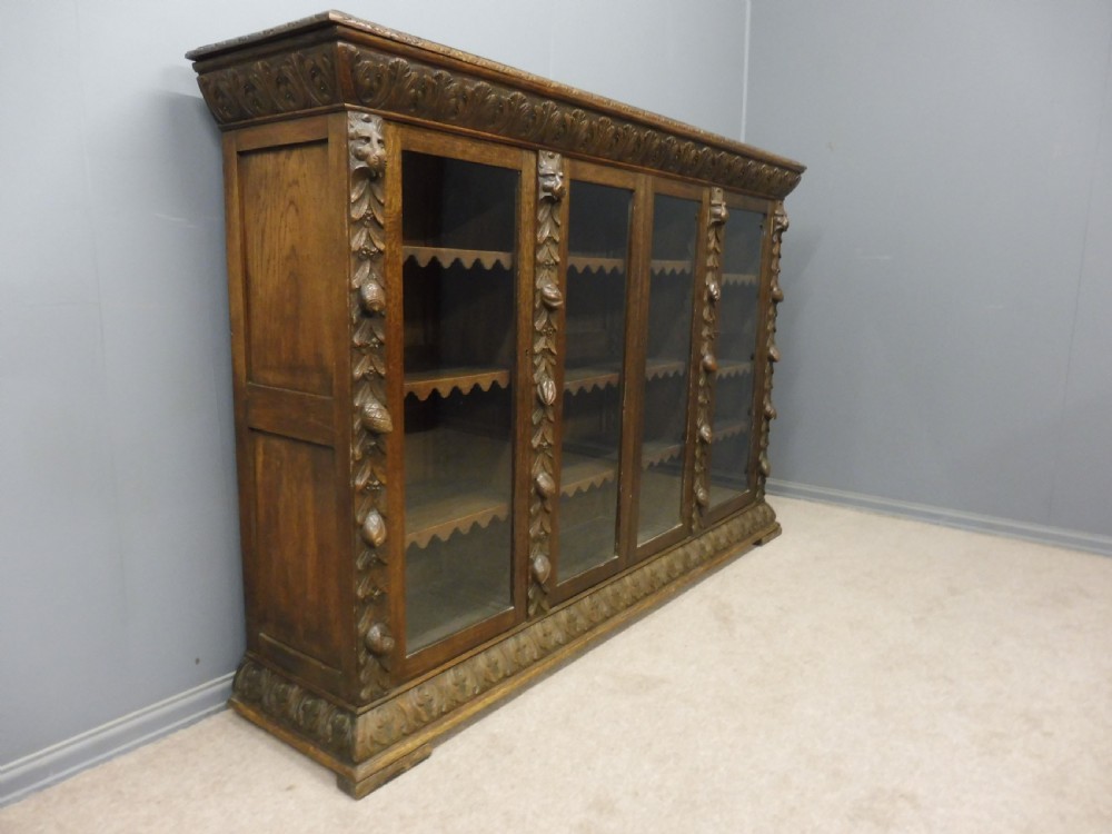 CARVED OAK 4 DOOR BOOKCASE CIRCA 1890 View III