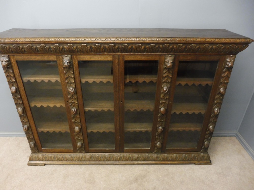 CARVED OAK 4 DOOR BOOKCASE CIRCA 1890 View IV