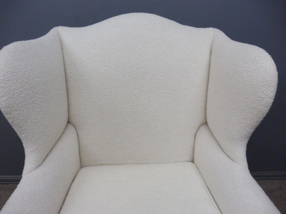 GENEROUSLY SIZED ANTIQUE WINGED ARMCHAIR CIRCA 1900 View IV