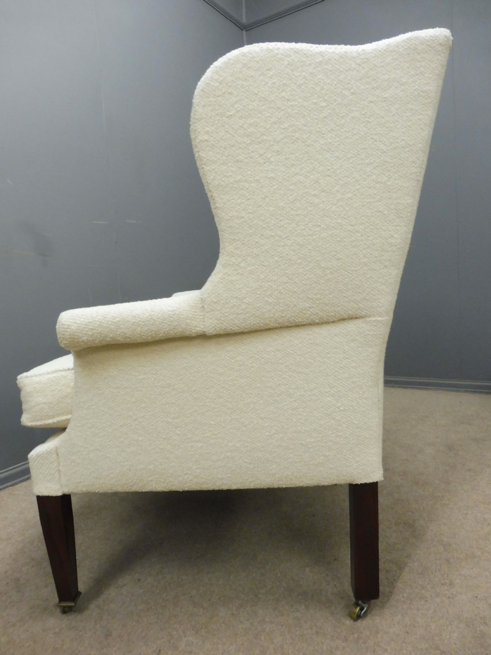 GENEROUSLY SIZED ANTIQUE WINGED ARMCHAIR CIRCA 1900 View VIII