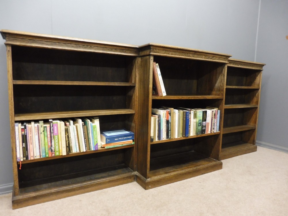LONG EDWARDIAN OAK BREAKFRONT BOOKCASE