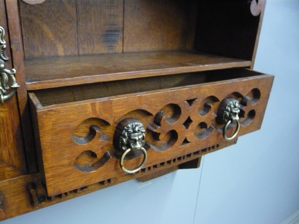 ARTS AND CRAFTS CARVED OAK GLAZED WALL CABINET 1910 View III