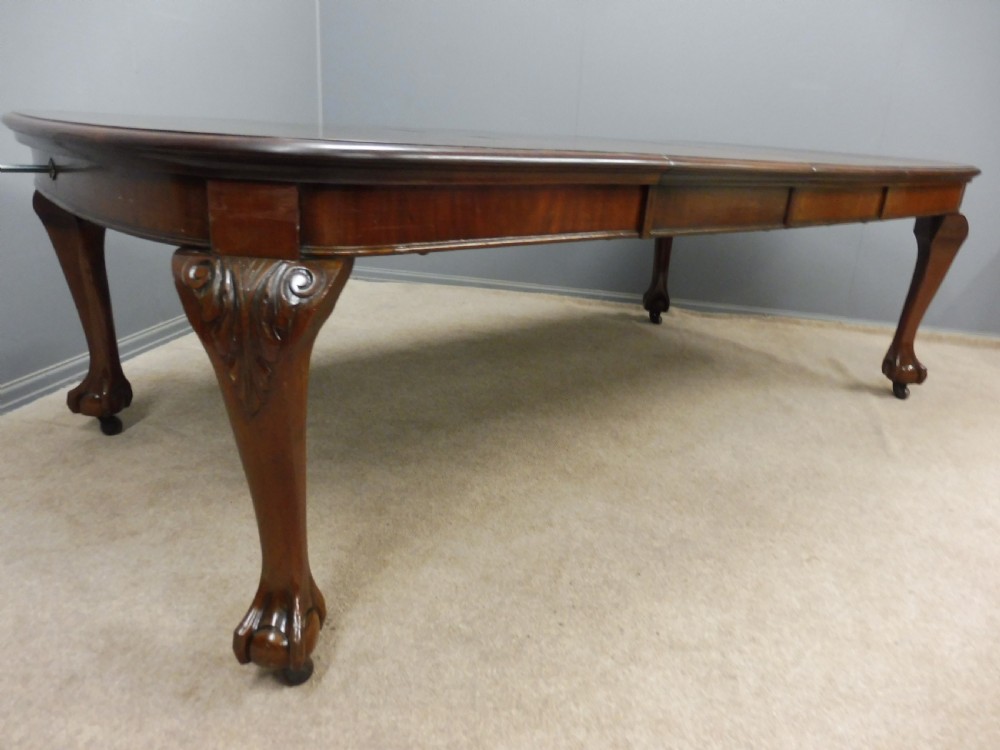 LARGE MAHOGANY EXTENDING WIND OUT DINING TABLE CIRCA 1890-1900 View VII