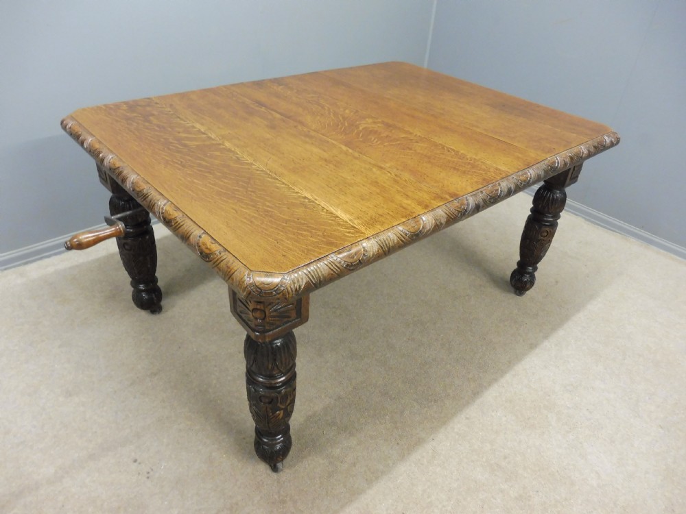 SMALL VICTORIAN CARVED OAK EXTENDING DINING TABLE View III