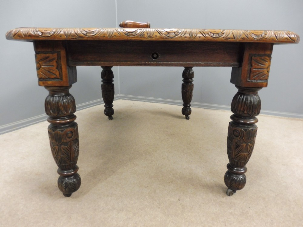 SMALL VICTORIAN CARVED OAK EXTENDING DINING TABLE View IV