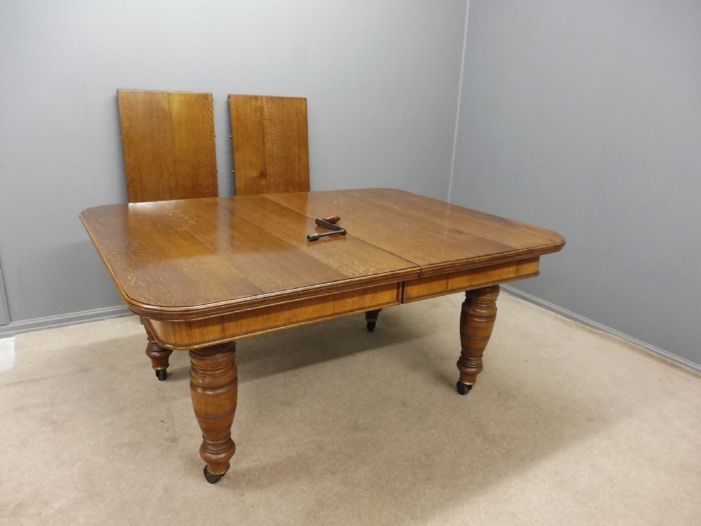 GOLDEN OAK VICTORIAN EXTENDING DINING TABLE SEATS UP TO 10 View XIII