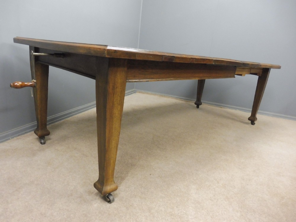 OAK ARTS AND CRAFTS EXTENDING DINING TABLE SEATS 10 View II