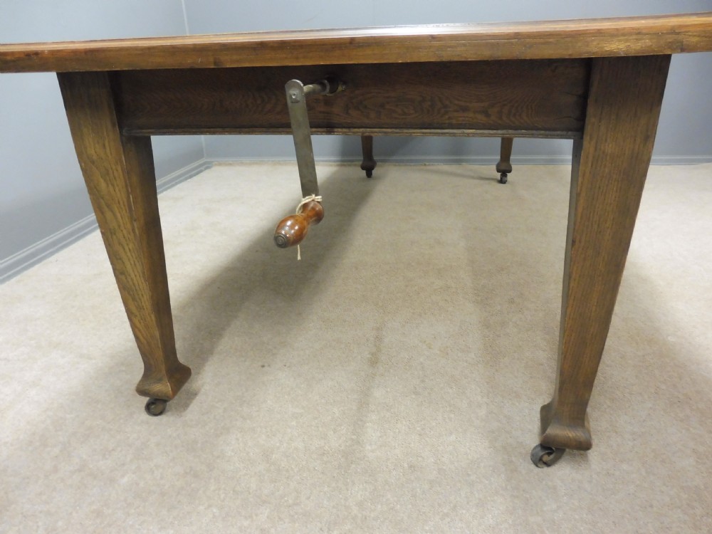 OAK ARTS AND CRAFTS EXTENDING DINING TABLE SEATS 10 View V