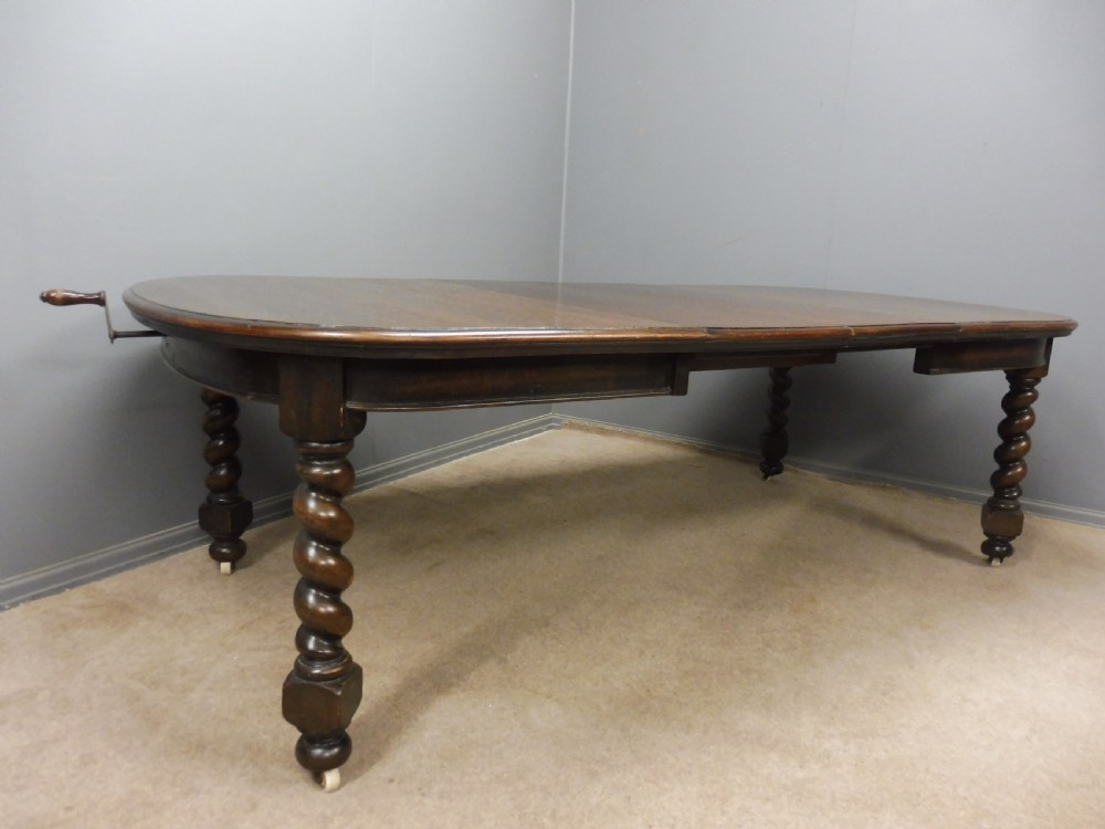 VICTORIAN OAK TWIST LEG EXTENDING WIND OUT DINING TABLE