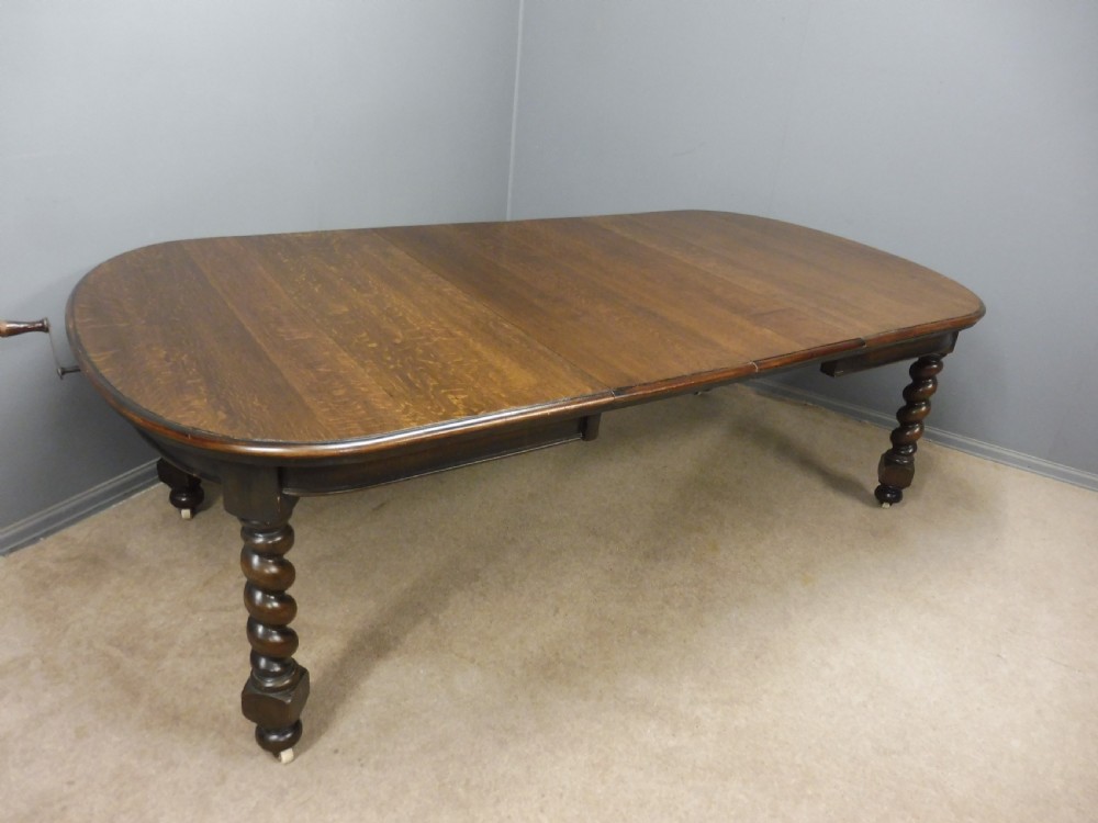 VICTORIAN OAK TWIST LEG EXTENDING WIND OUT DINING TABLE View II