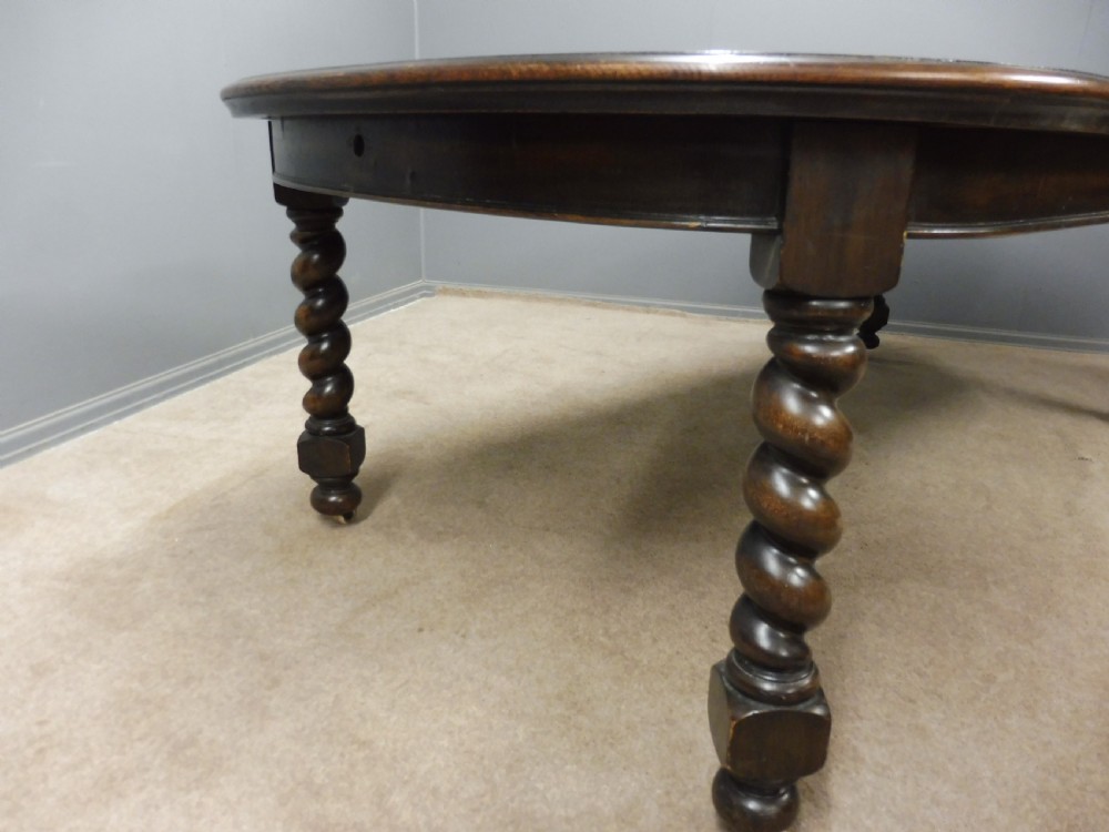 VICTORIAN OAK TWIST LEG EXTENDING WIND OUT DINING TABLE View IX
