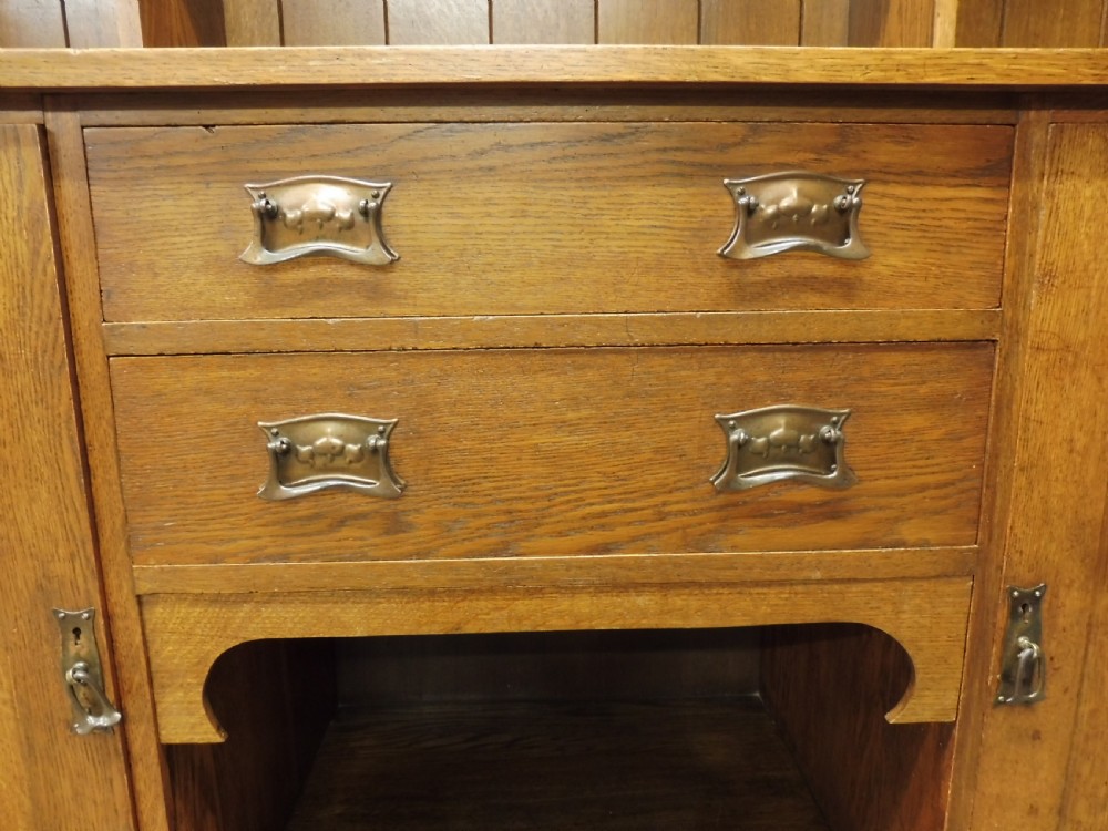 OAK ARTS AND CRAFTS DRESSER BY MAPLE AND CO View XI