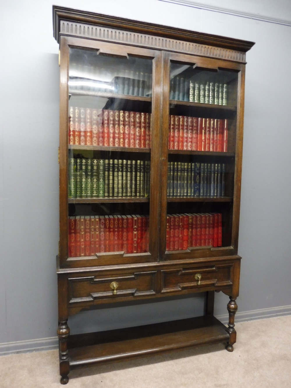 EDWARDIAN OAK BOOKCASE BY MAPLE AND CO