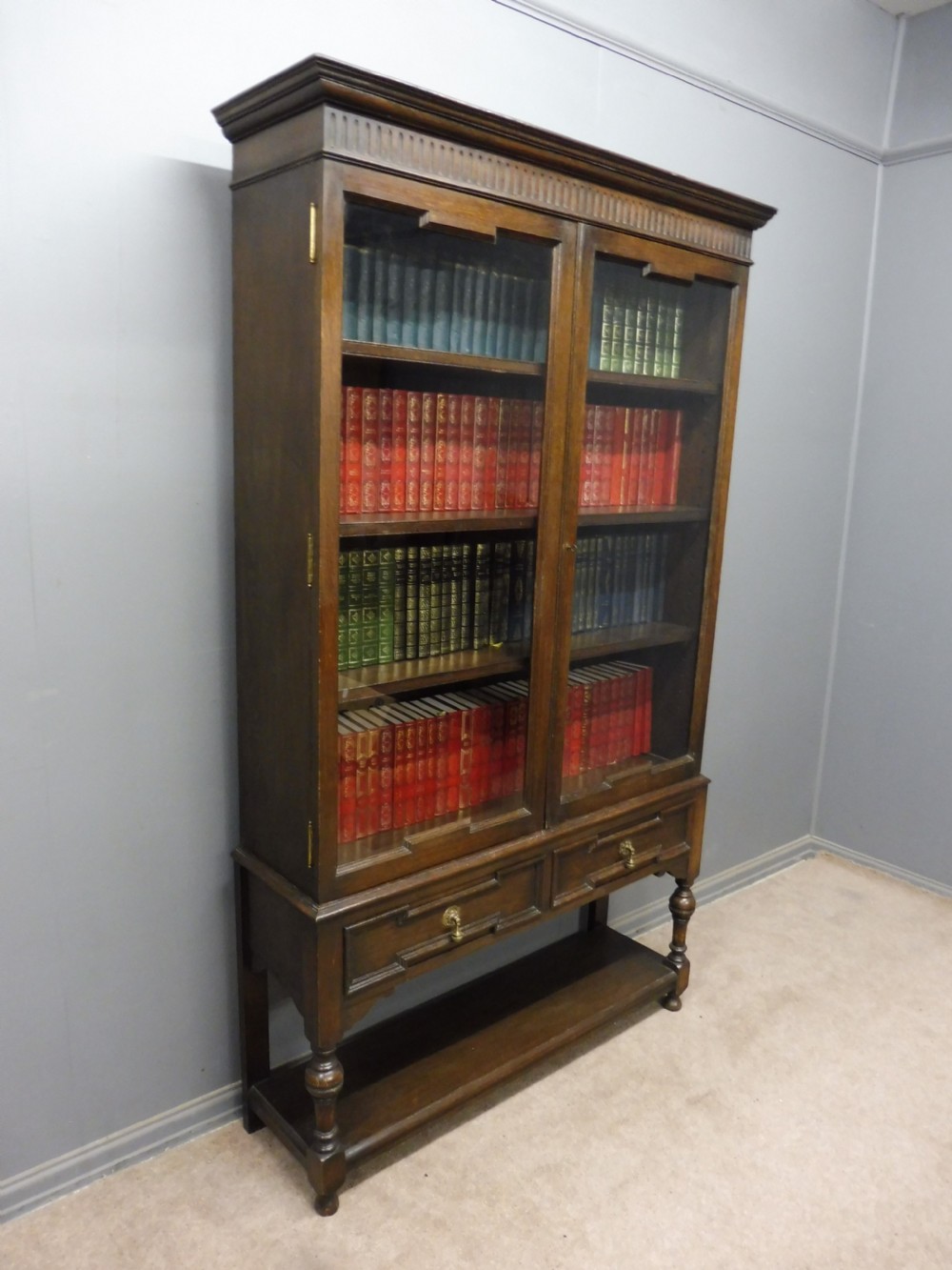 EDWARDIAN OAK BOOKCASE BY MAPLE AND CO View II