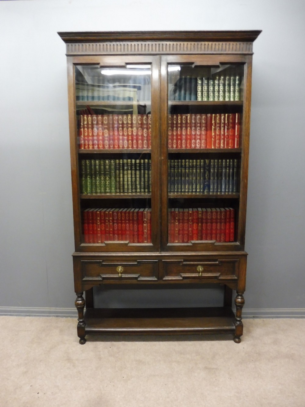 EDWARDIAN OAK BOOKCASE BY MAPLE AND CO View III