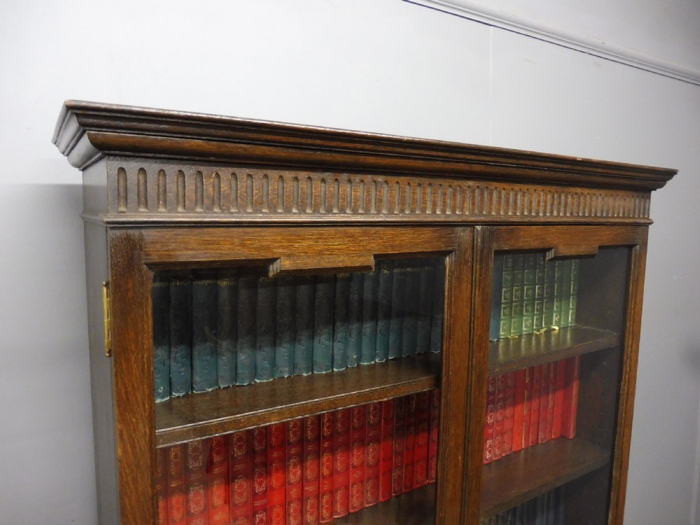EDWARDIAN OAK BOOKCASE BY MAPLE AND CO View VII