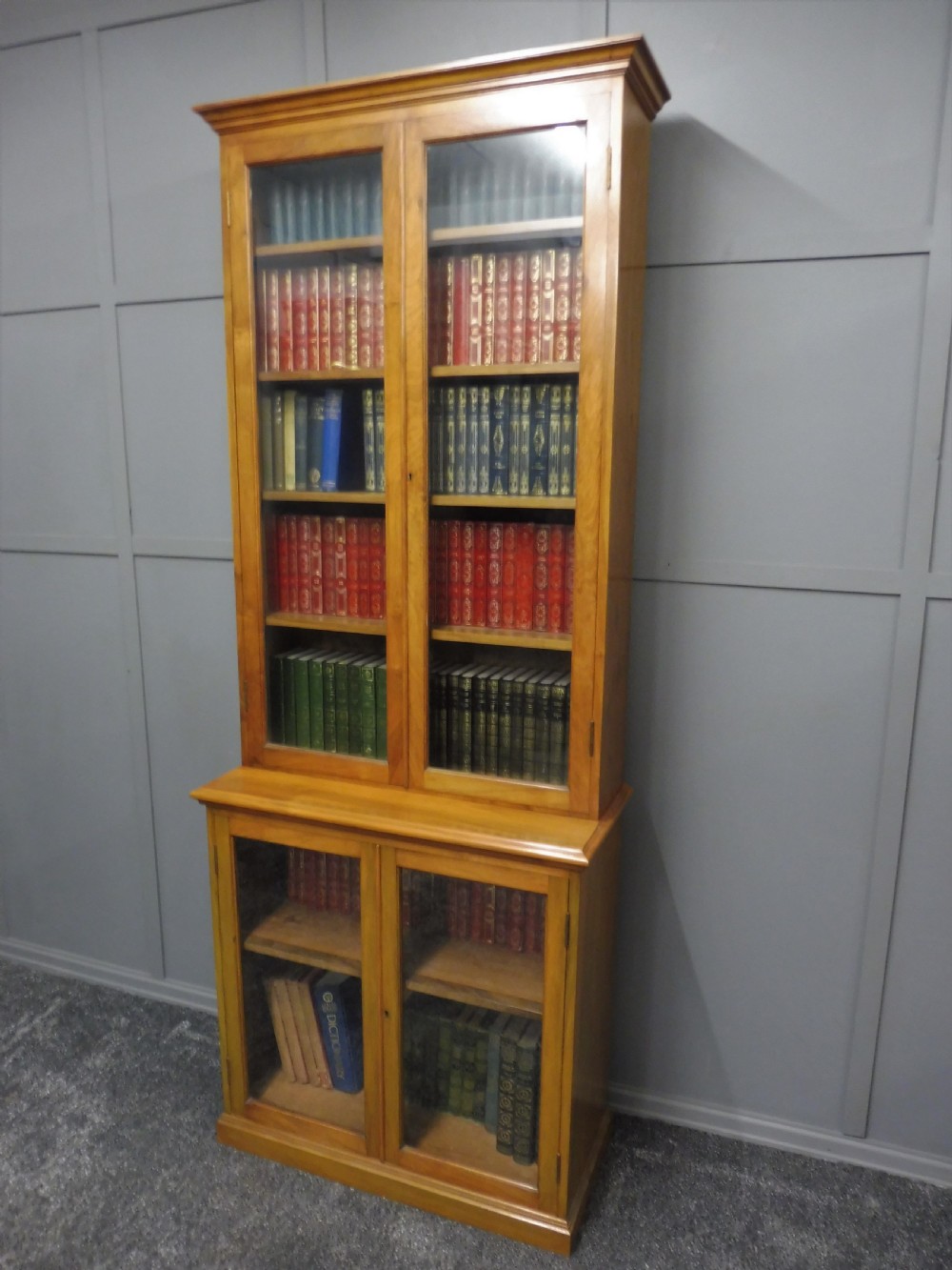 SLIM LIGHT WALNUT GLAZED BOOKCASE