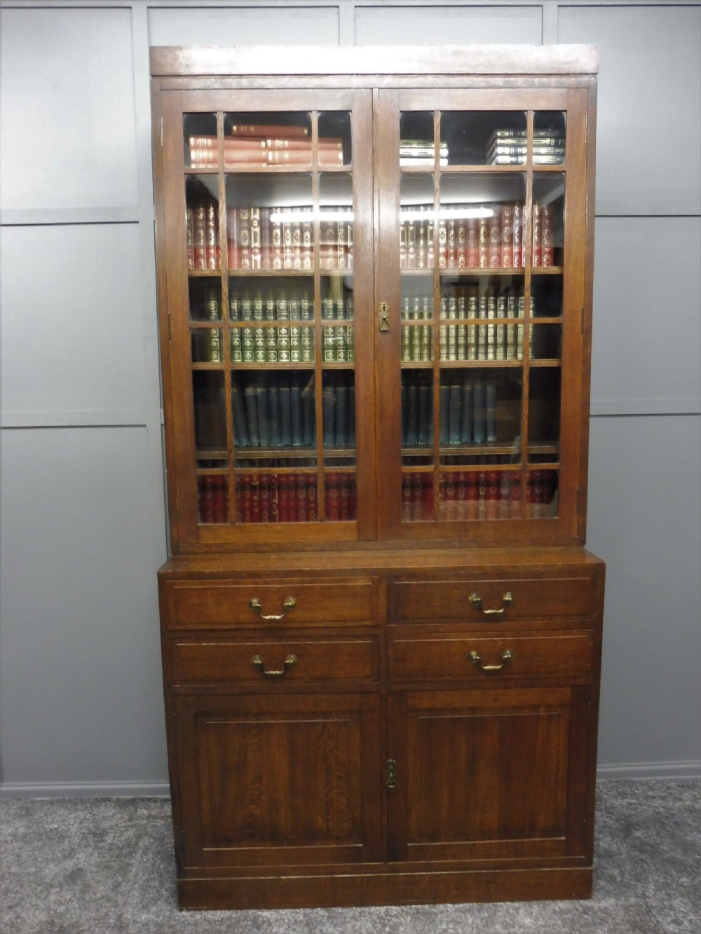 OAK ARTS AND CRAFTS CABINET BOOKCASE