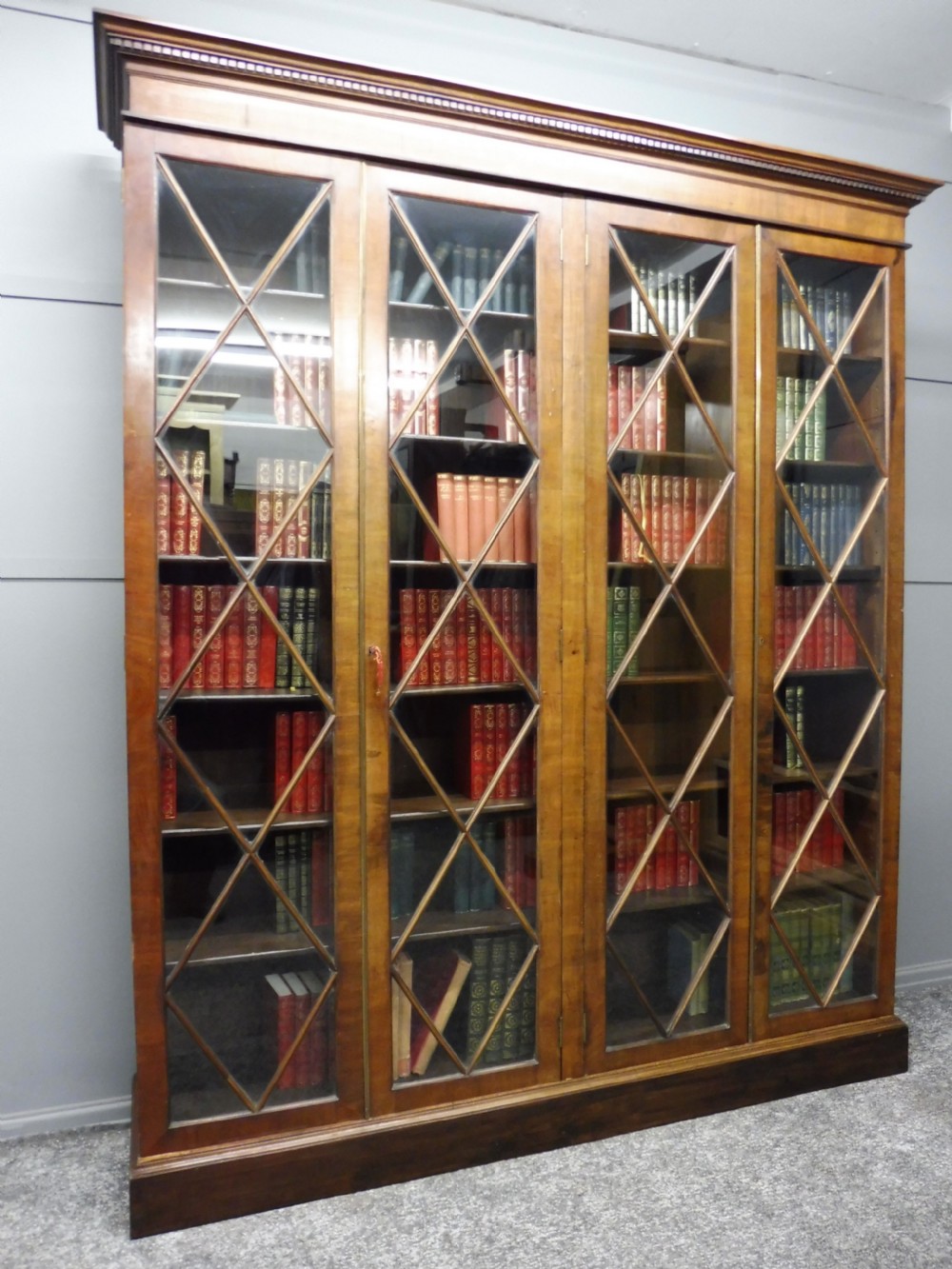 LARGE VICTORIAN MAHOGANY FOUR DOOR BOOKCASE