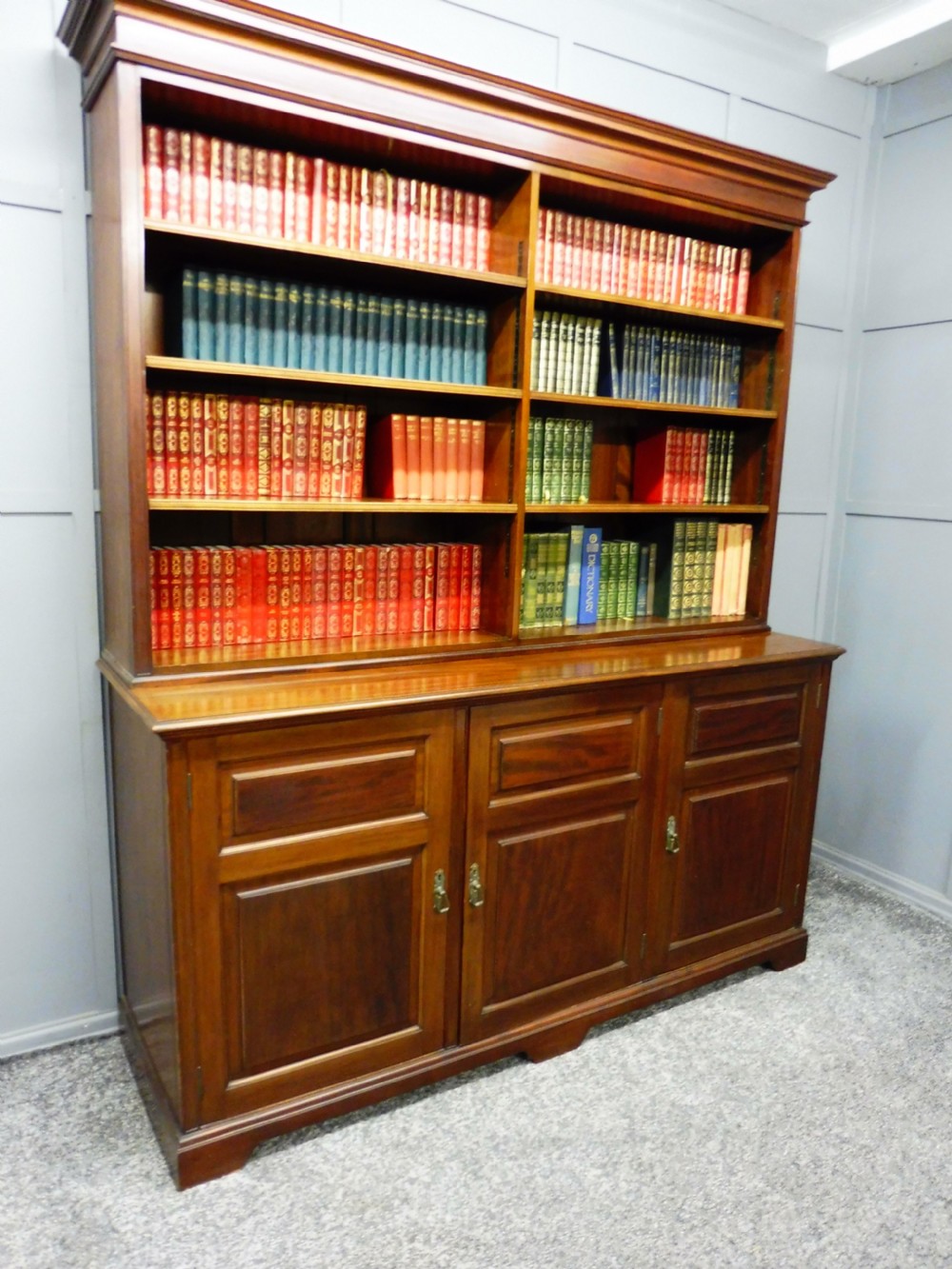 MAHOGANY BOOKCASE ON CUPBOARD  View II