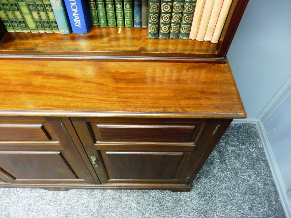 MAHOGANY BOOKCASE ON CUPBOARD  View VII