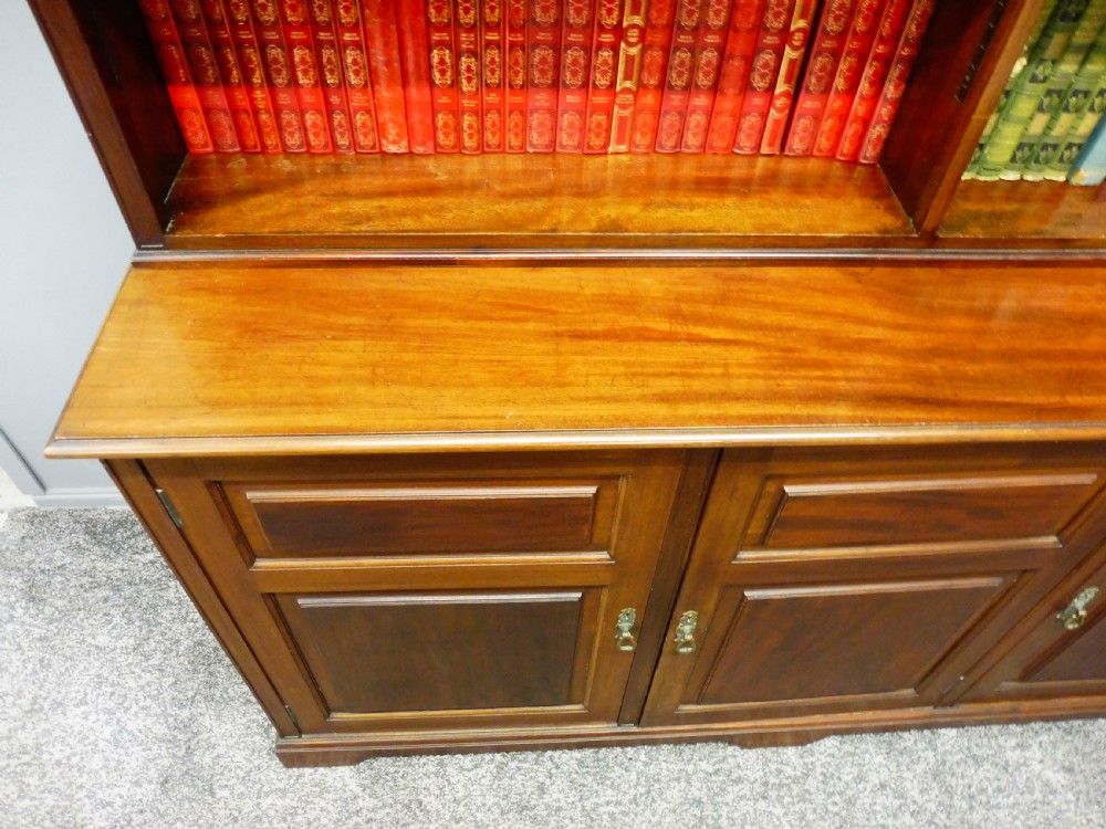 MAHOGANY BOOKCASE ON CUPBOARD  View VIII